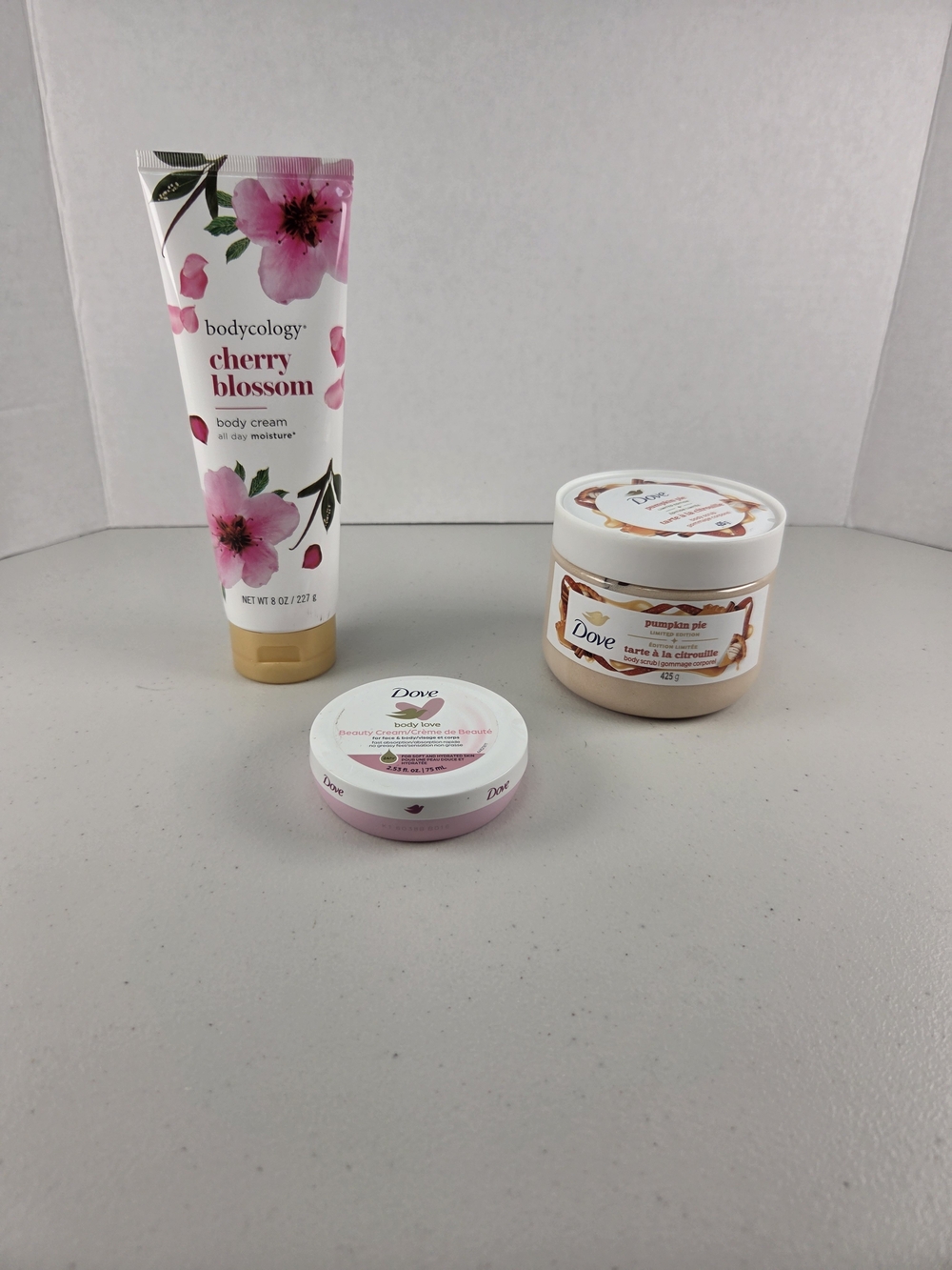 3 Pc Lotion Bundle Dove Body Crm, Dove Body Scrub, & Bodycology Body Cream